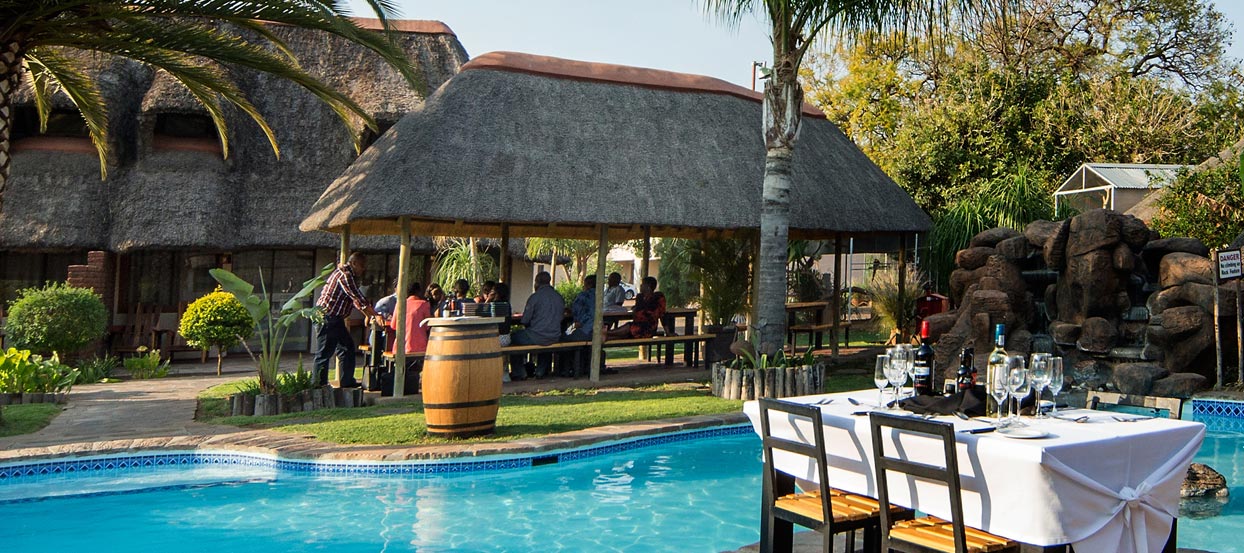 Outside dining next to the swimming pool